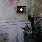 Caged Wall Light Small Black Marble Lifestyle